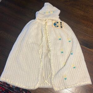 Newborn hooded knit cape